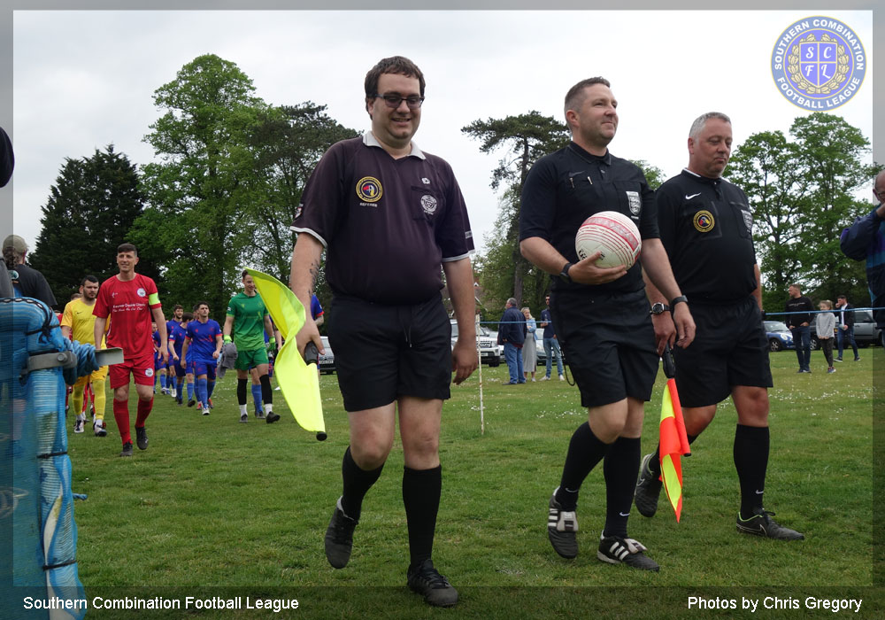 Officials entering the field of play